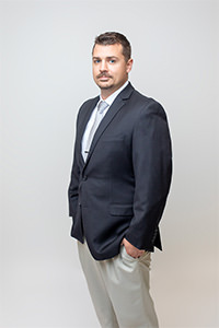 Professional photo of Adam Shultz / Managing Broker